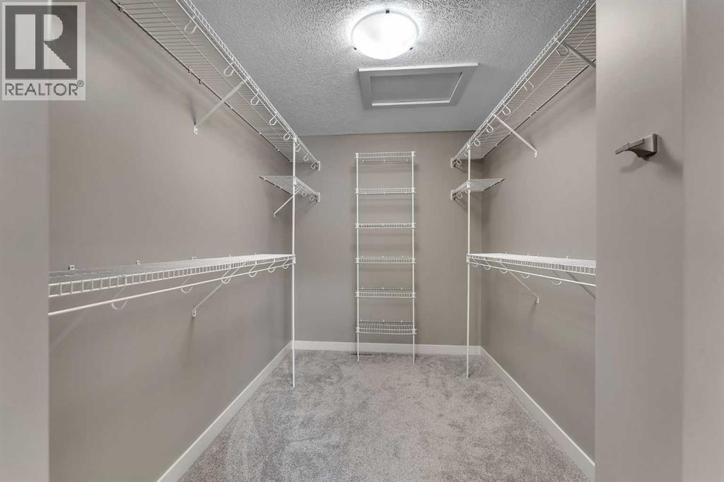 204 Sunset View, Cochrane, Alberta  T4C 0E9 - Photo 31 - A2268934