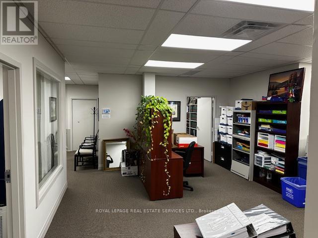 200 - 235 Lakeshore Road E, Oakville, Ontario  L6J 1A7 - Photo 9 - W12552664