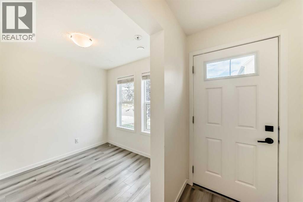 203 South Point Park Sw, Airdrie, Alberta  T4B 5G8 - Photo 3 - A2264535