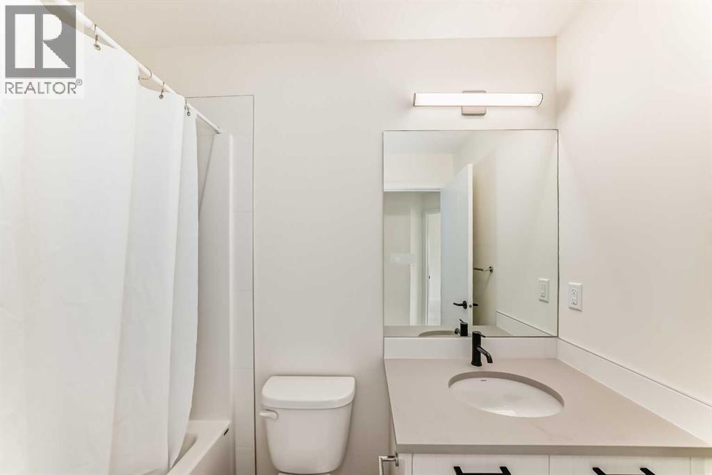 203 South Point Park Sw, Airdrie, Alberta  T4B 5G8 - Photo 33 - A2264535