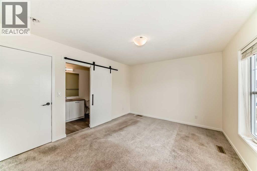 203 South Point Park Sw, Airdrie, Alberta  T4B 5G8 - Photo 21 - A2264535