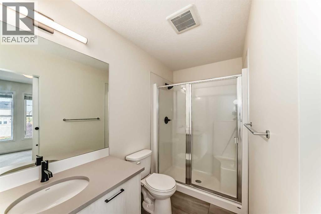 203 South Point Park Sw, Airdrie, Alberta  T4B 5G8 - Photo 25 - A2264535