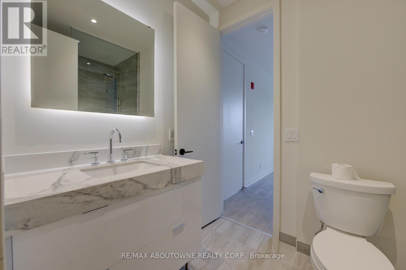 314 - 123 Maurice Drive, Oakville, Ontario  L6K 2W6 - Photo 13 - W12552838