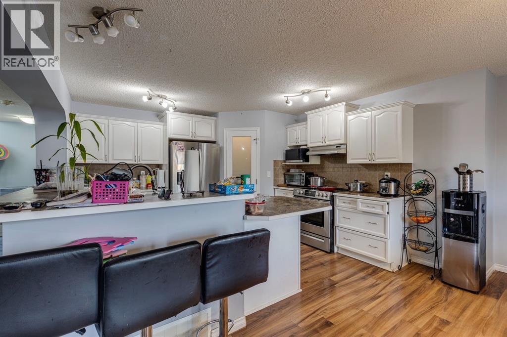 47 Westmount Road, Okotoks, Alberta  T1S 2J3 - Photo 7 - A2266980