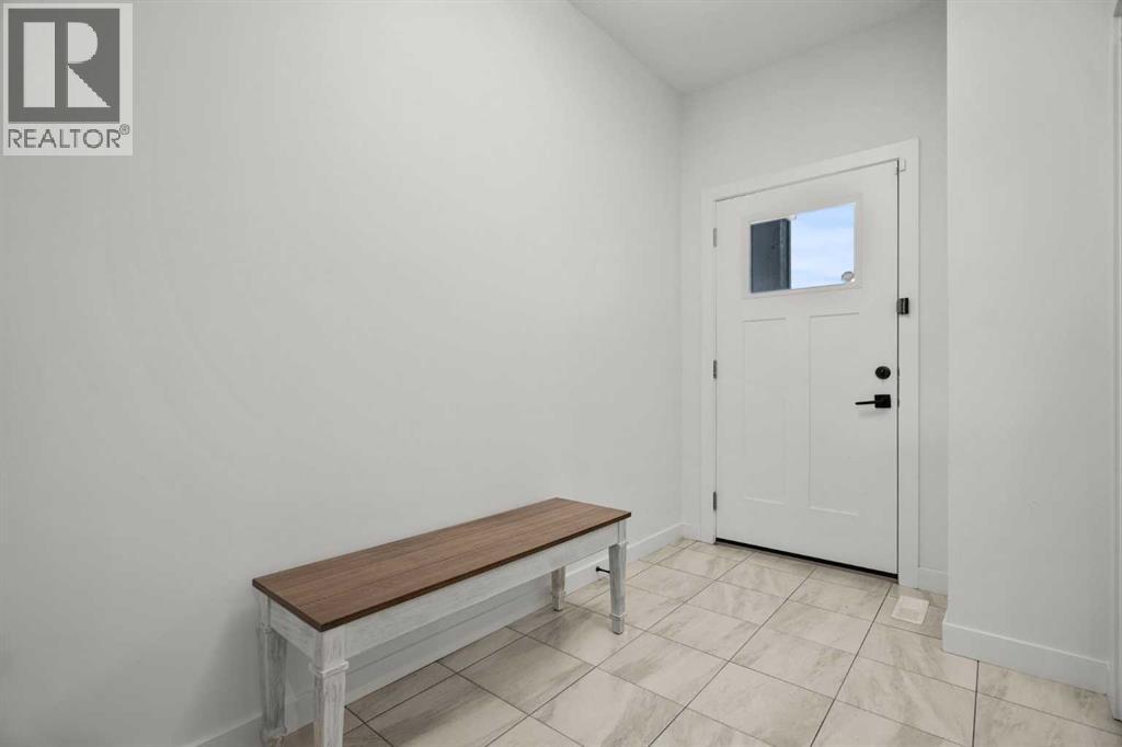 61 Carringsby Way Nw, Calgary, Alberta  T3P 1T4 - Photo 3 - A2271024