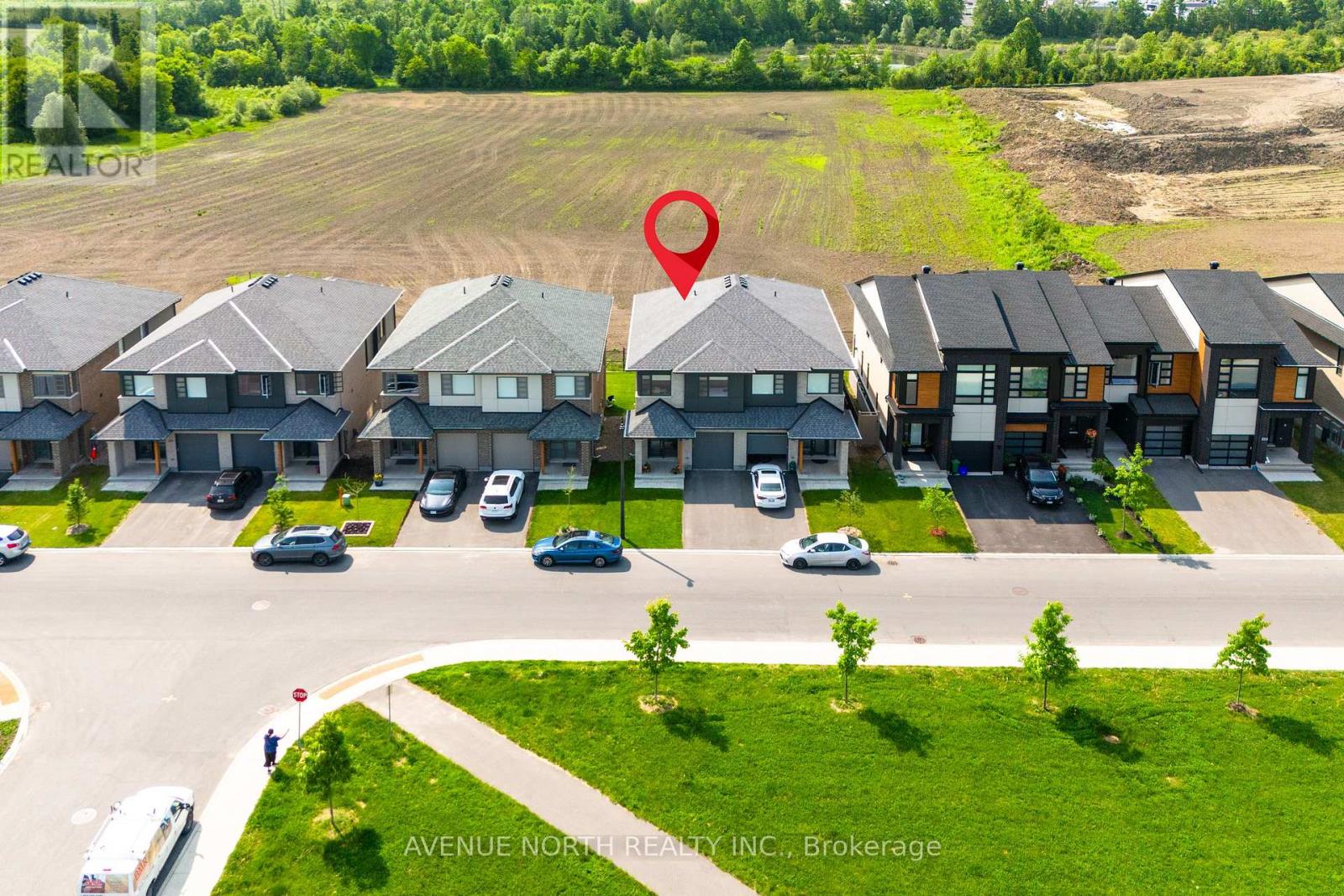 244 Shuttleworth Drive, Ottawa, Ontario  K1T 0T4 - Photo 2 - X12553222