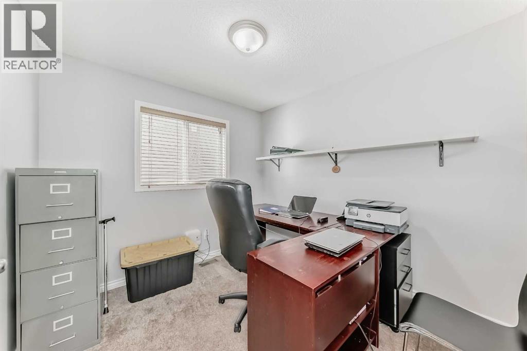 307 Panatella Court Nw, Calgary, Alberta  T3K 5Y1 - Photo 9 - A2265812