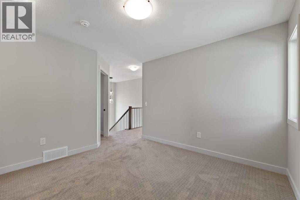 86 Emerson Crescent, Okotoks, Alberta  T1S 3M9 - Photo 16 - A2264331