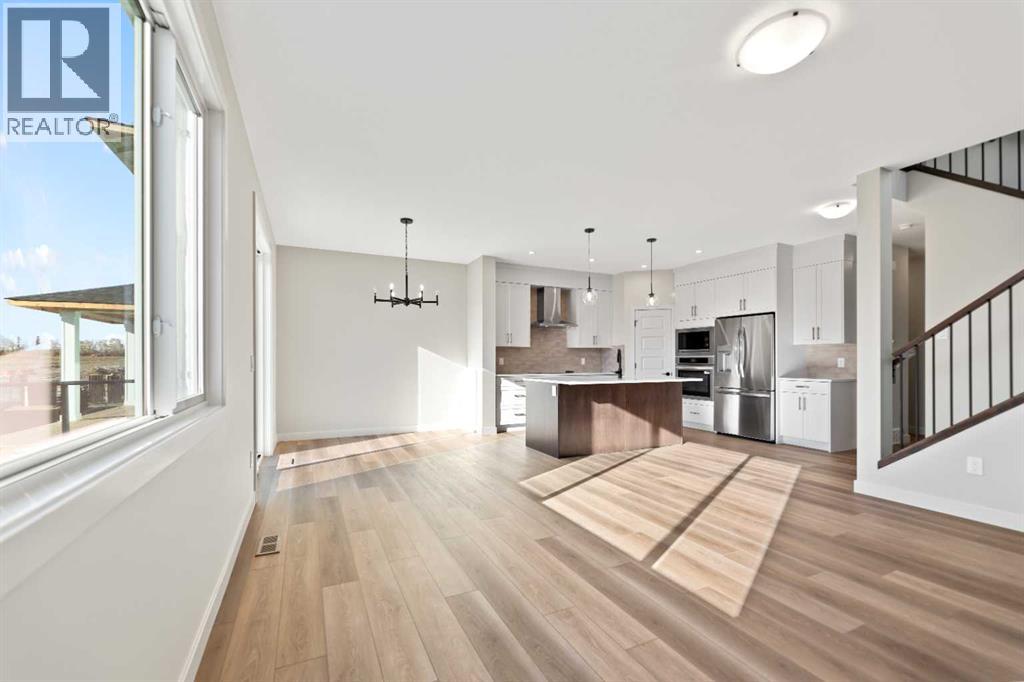 86 Emerson Crescent, Okotoks, Alberta  T1S 3M9 - Photo 9 - A2264331