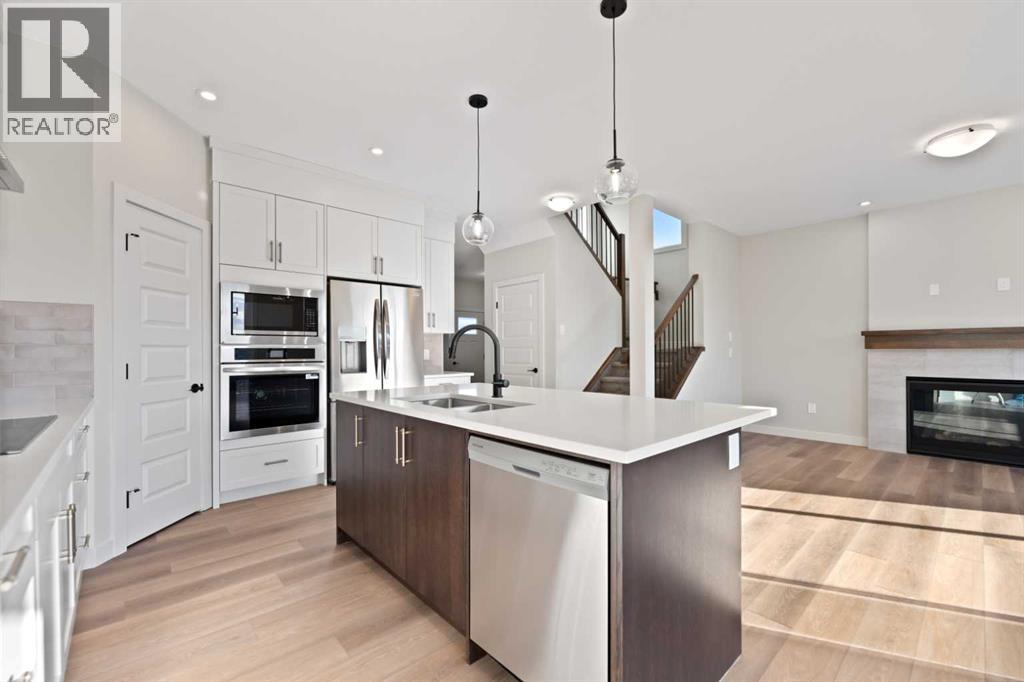 86 Emerson Crescent, Okotoks, Alberta  T1S 3M9 - Photo 7 - A2264331