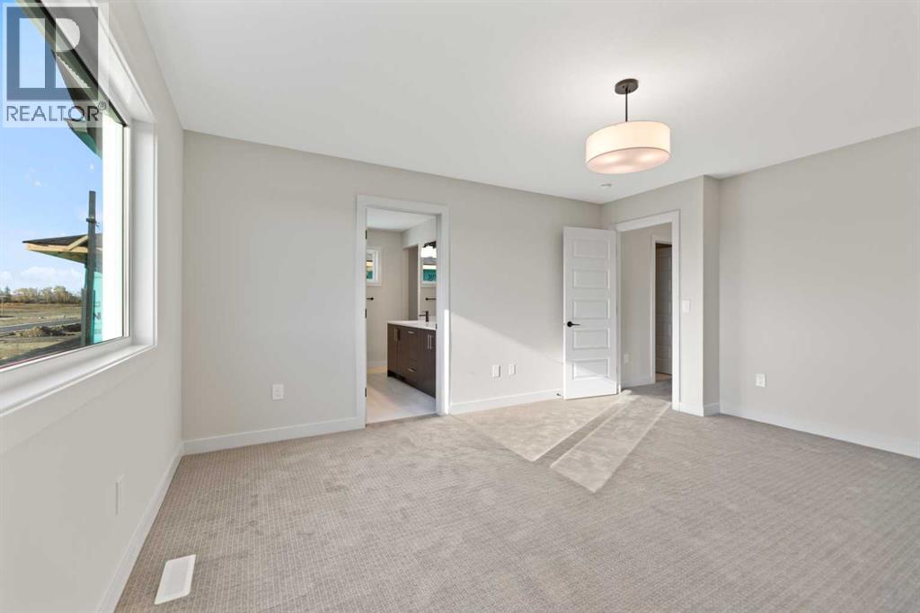 86 Emerson Crescent, Okotoks, Alberta  T1S 3M9 - Photo 19 - A2264331