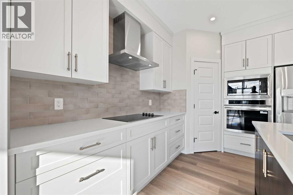 86 Emerson Crescent, Okotoks, Alberta  T1S 3M9 - Photo 5 - A2264331