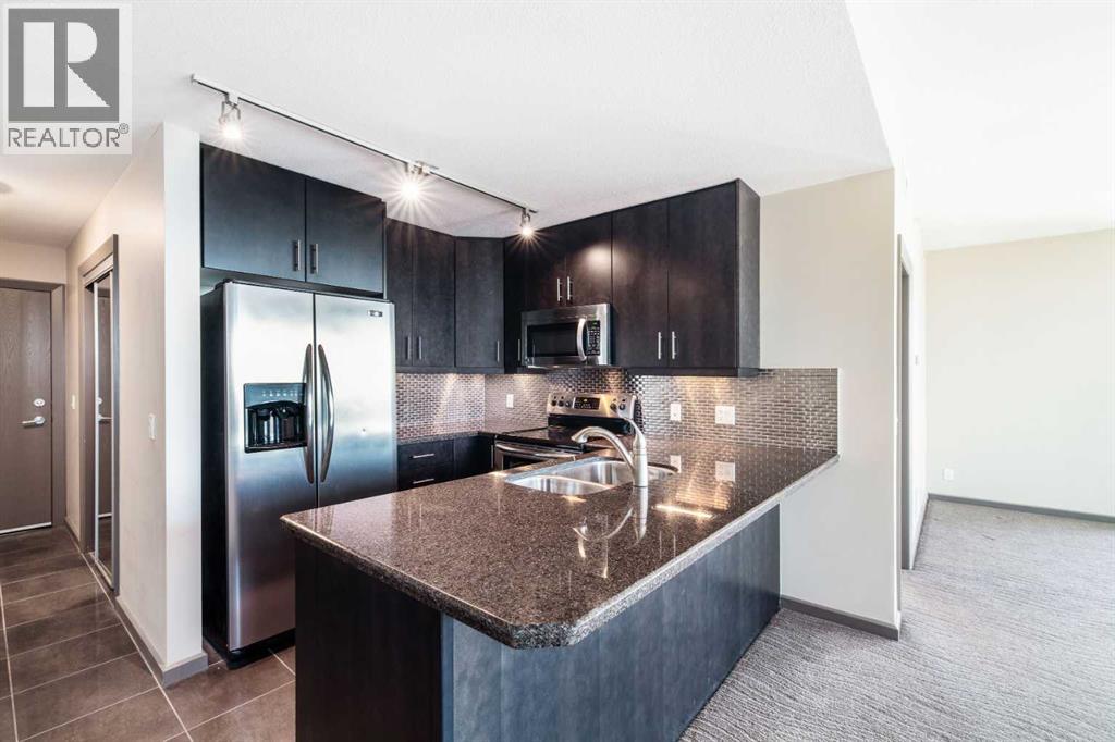 2010, 210 15 Avenue Se, Calgary, Alberta  T2B 0B5 - Photo 4 - A2265418