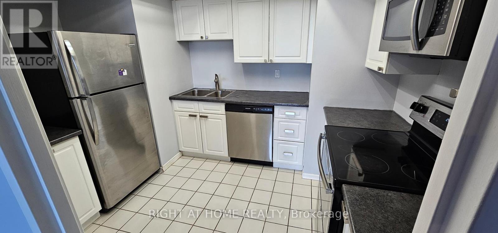 411 - 4460 Tucana Court, Mississauga, Ontario  L5R 3R4 - Photo 2 - W12553460