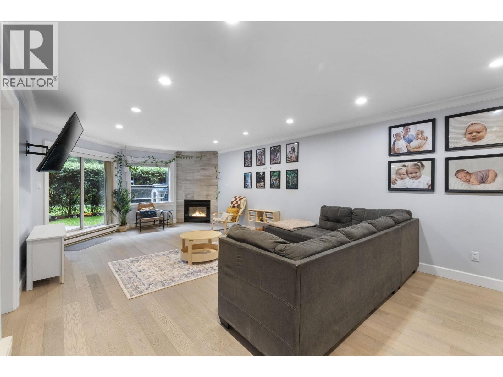 102 1500 Ostler Court, North Vancouver, British Columbia  V7G 2S2 - Photo 2 - R3068181