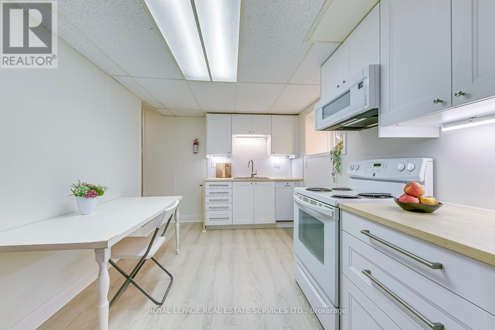 4 - 63 High Park Boulevard, Toronto, Ontario  M6R 1M9 - Photo 6 - W12465135