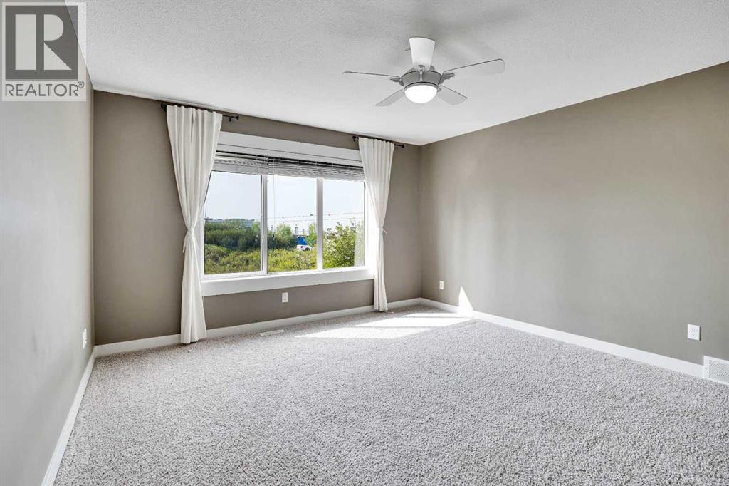 157 Rainbow Falls Boulevard, Chestermere, Alberta  T1X 0N6 - Photo 18 - A2254670