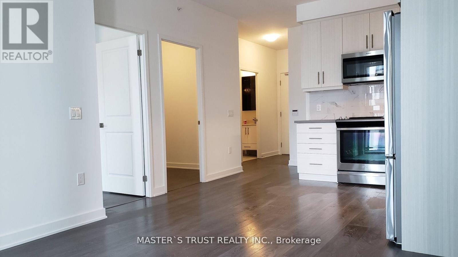 1111 - 85 Oneida Crescent, Richmond Hill, Ontario  L4B 0H4 - Photo 2 - N12553608