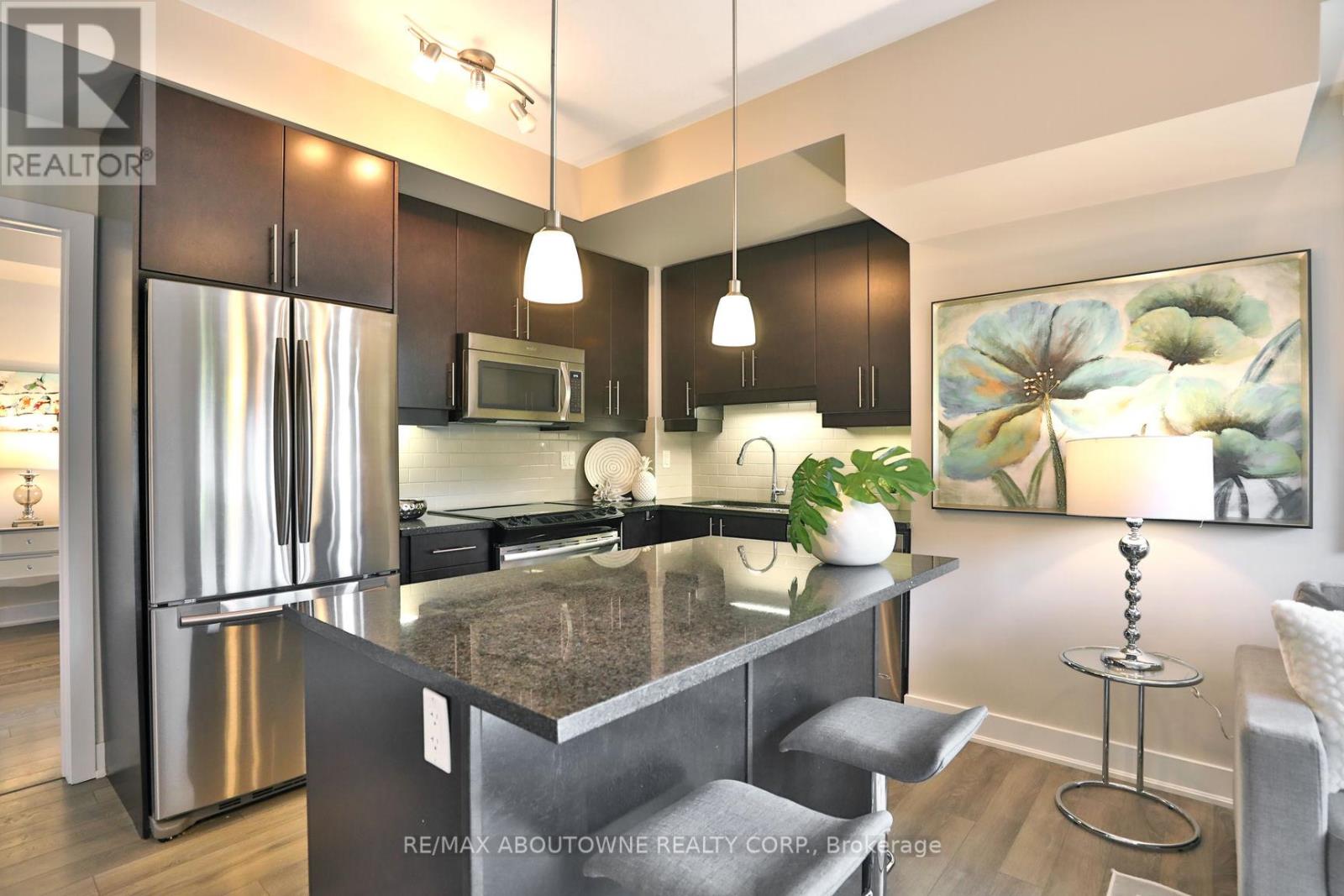 103 - 128 Garden Drive, Oakville, Ontario  L6K 0H7 - Photo 12 - W12553688