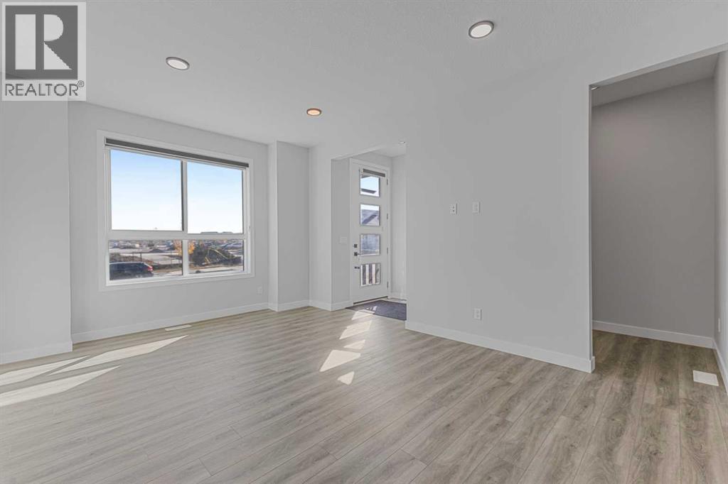 33 Belmont Drive Sw, Calgary, Alberta  T2X 4Z6 - Photo 4 - A2264027