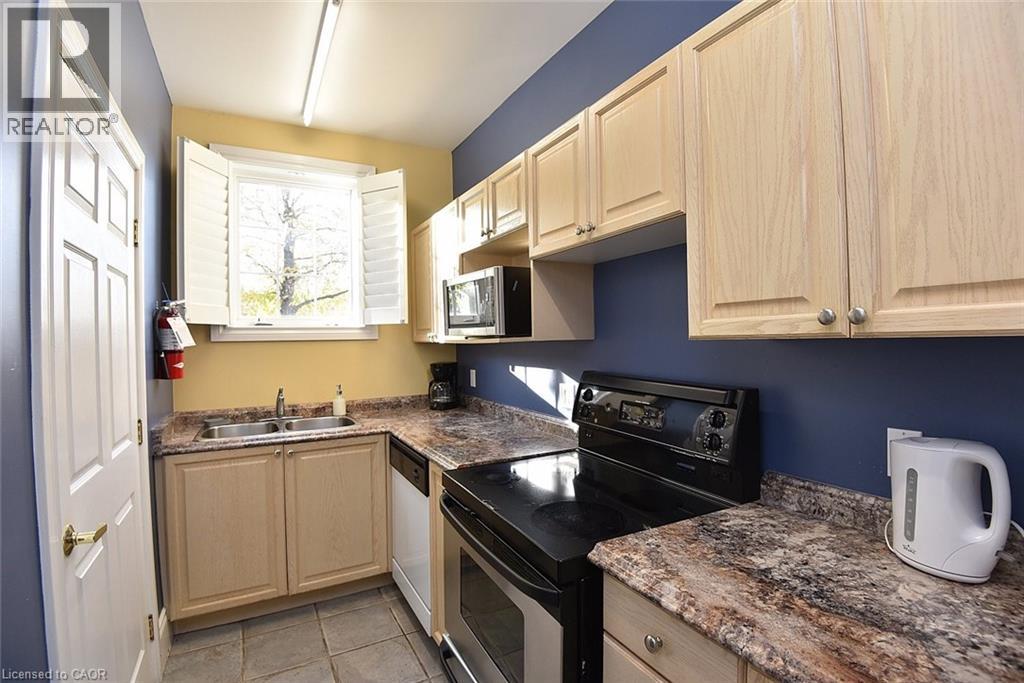 1421 Walkers Line Unit# 203, Burlington, Ontario  L7M 4P4 - Photo 38 - 40788113