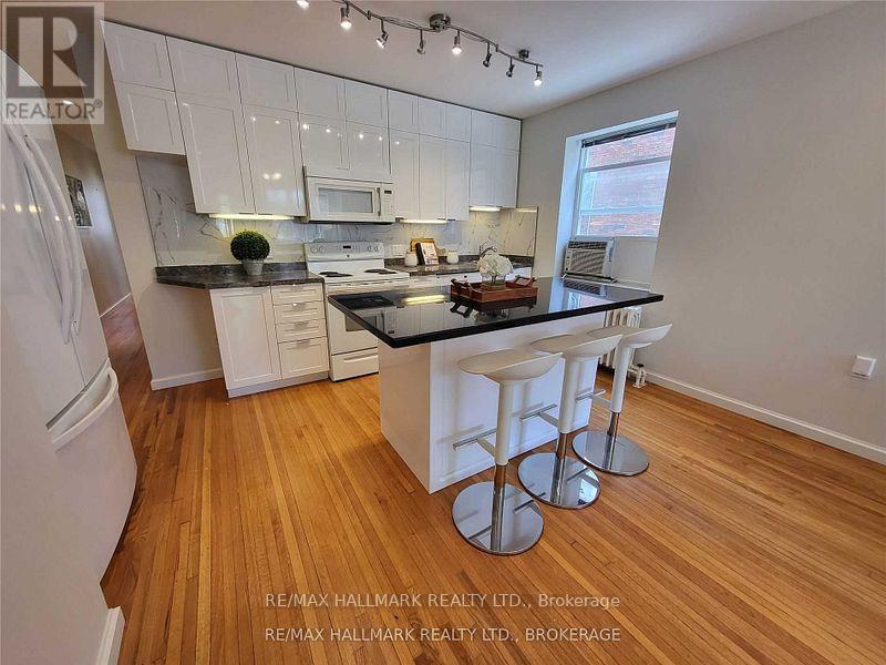 Main - 8 Bonfield Avenue, Toronto, Ontario  M4E 1C1 - Photo 3 - E12553958