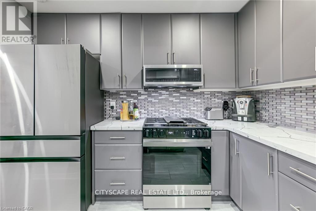 17 - 30 Heslop Road, Milton, Ontario  L9T 1B3 - Photo 7 - W12554246