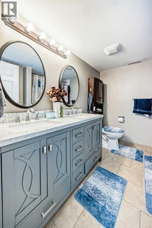 133 & 135 Huntford Close Ne, Calgary, Alberta  T2K 3Y7 - Photo 21 - A2261915