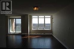 909 - 130 Pond Drive, Markham, Ontario  L3T 7W5 - Photo 3 - N12554854