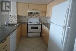 909 - 130 Pond Drive, Markham, Ontario  L3T 7W5 - Photo 4 - N12554854