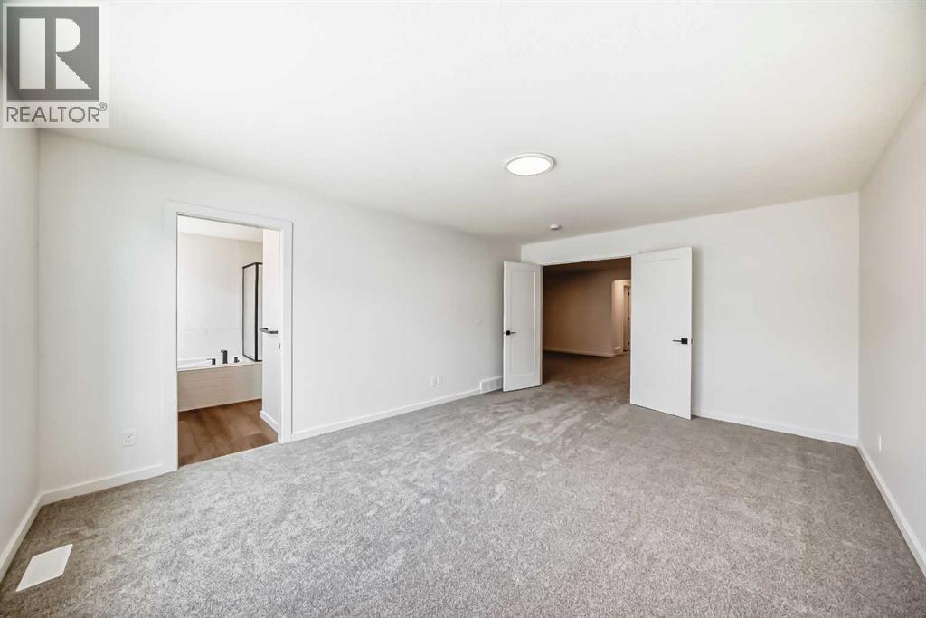 33 Royston Grove Nw, Calgary, Alberta  T3L 0M3 - Photo 21 - A2262825