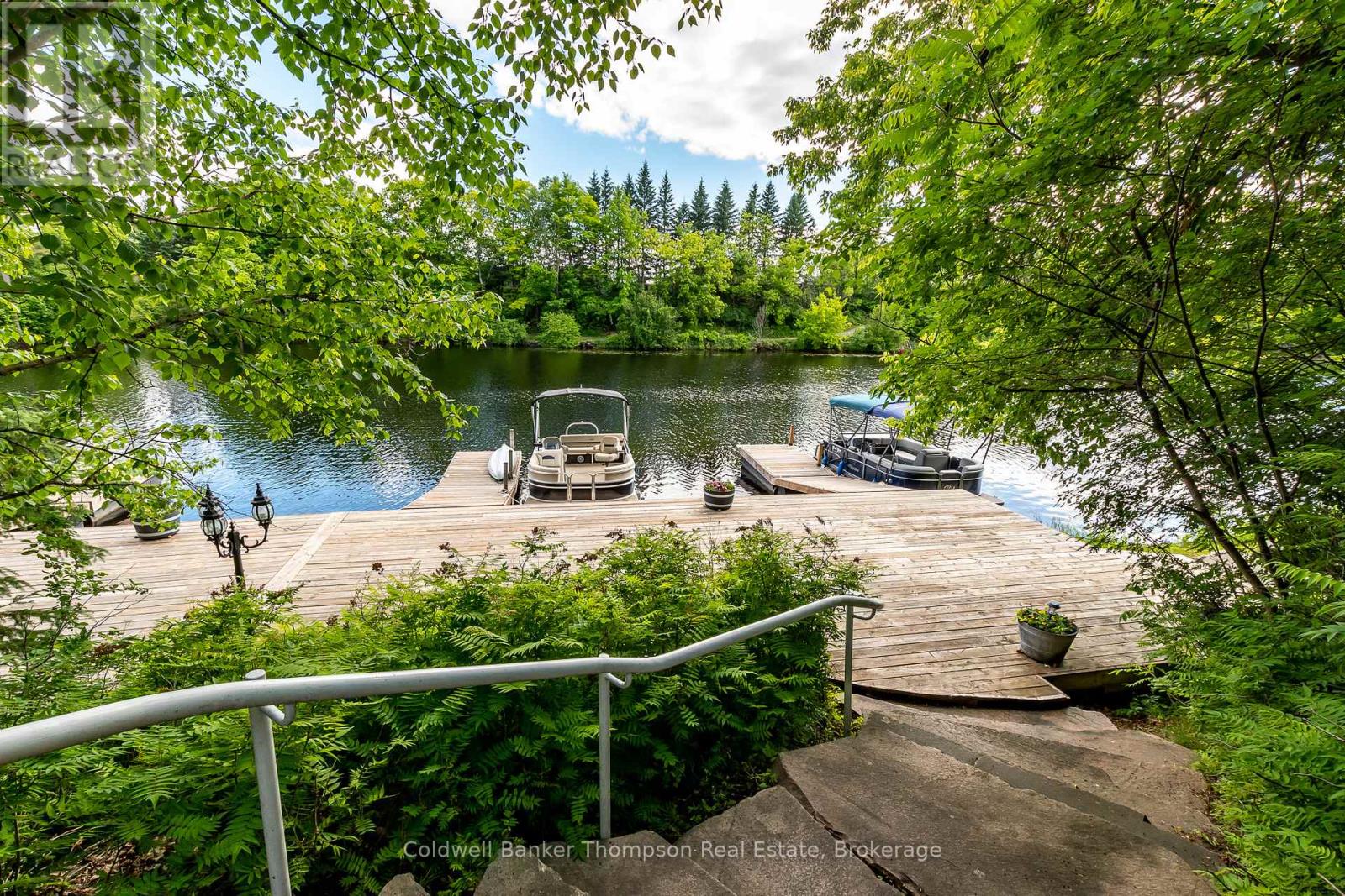 203 - 31 Dairy Lane, Huntsville, Ontario P1H 2L7 - Photo 2 - X12555330