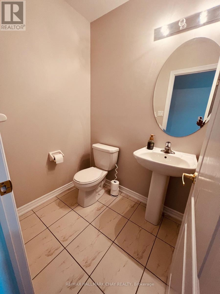 63 Greenwood Drive, Essa, Ontario  L0M 1B4 - Photo 13 - N12436046