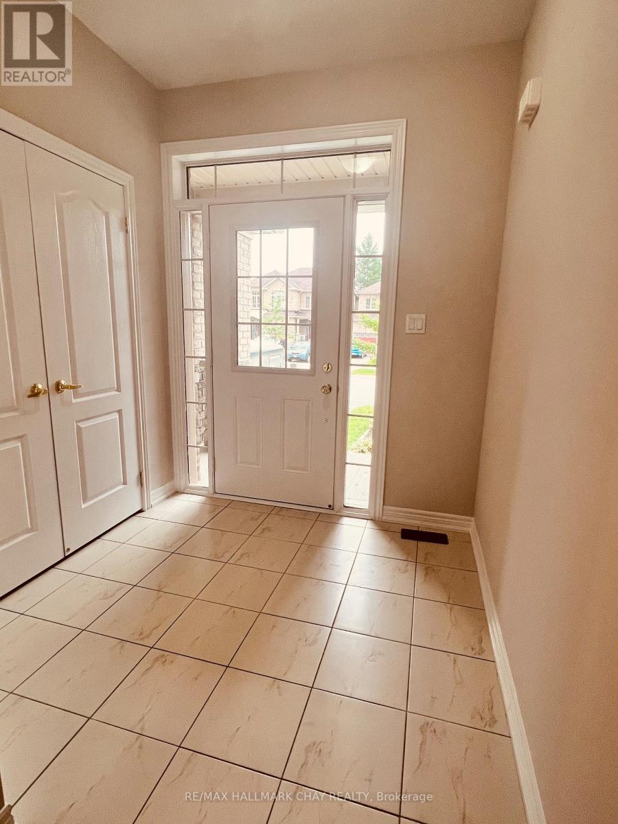 63 Greenwood Drive, Essa, Ontario  L0M 1B4 - Photo 2 - N12436046