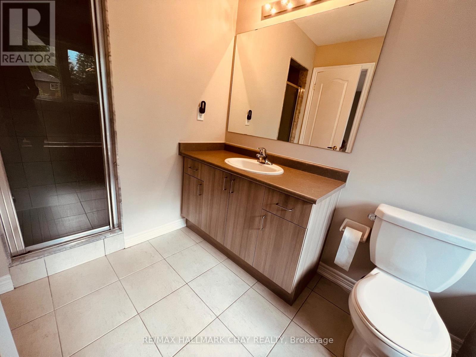 63 Greenwood Drive, Essa, Ontario  L0M 1B4 - Photo 7 - N12436046