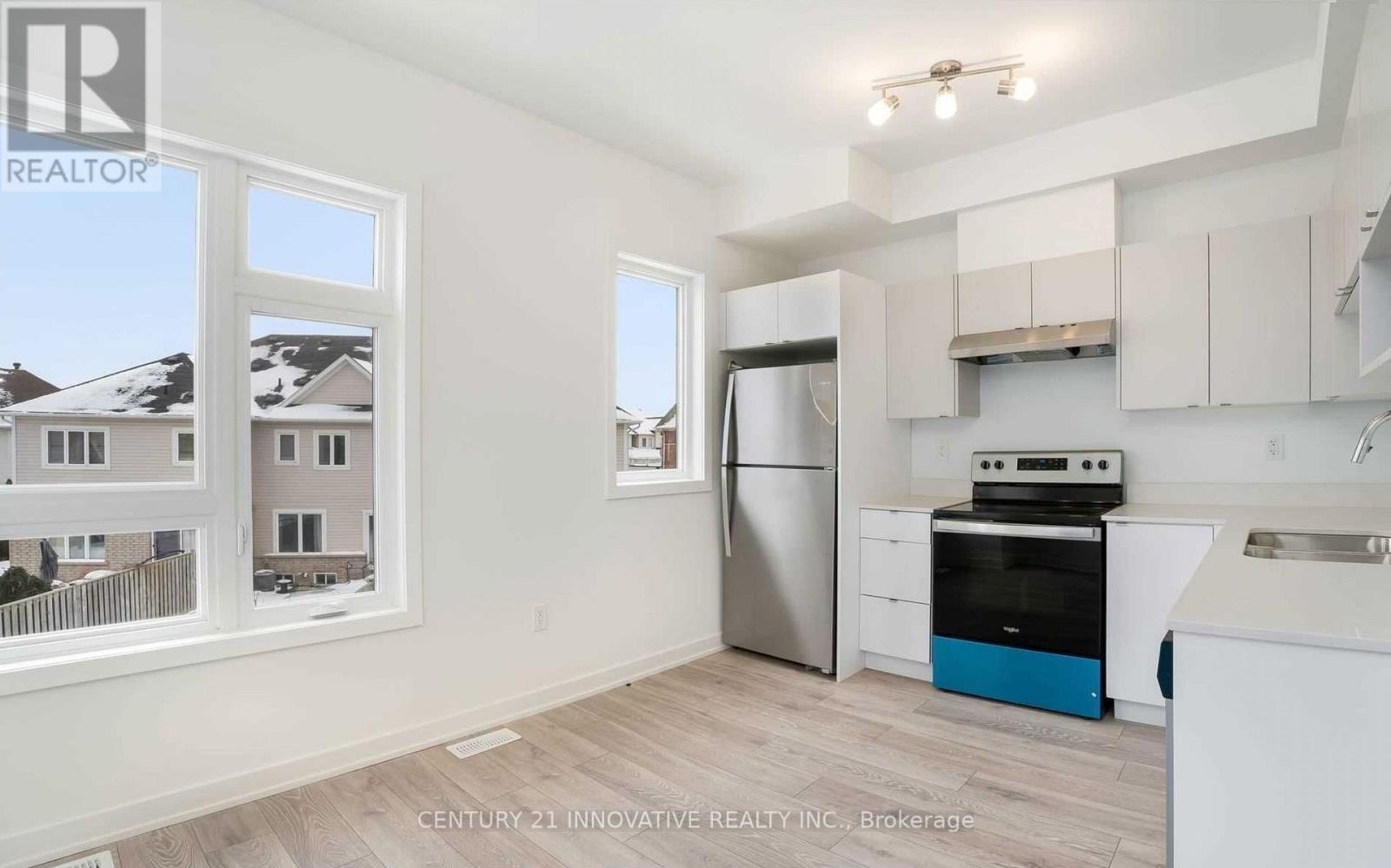 3079 Cherry Blossom Cmn, Burlington, Ontario  L7M 0H8 - Photo 4 - W12555312