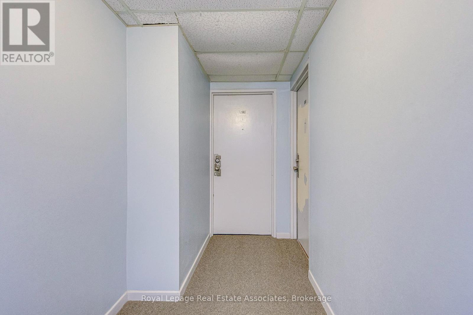 58 - 63 Conroy Crescent, Guelph, Ontario N1G 2V5 - Photo 4 - X12555534