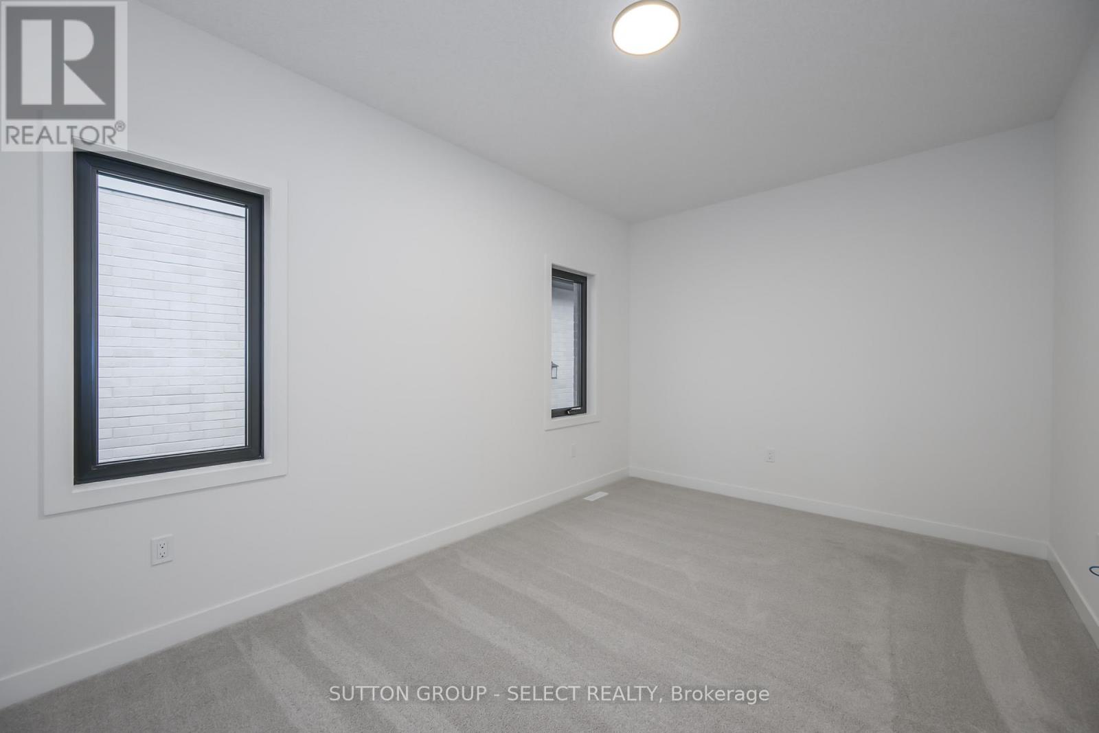 134 Harvest Lane, Thames Centre, Ontario  N0L 1G3 - Photo 23 - X12421126