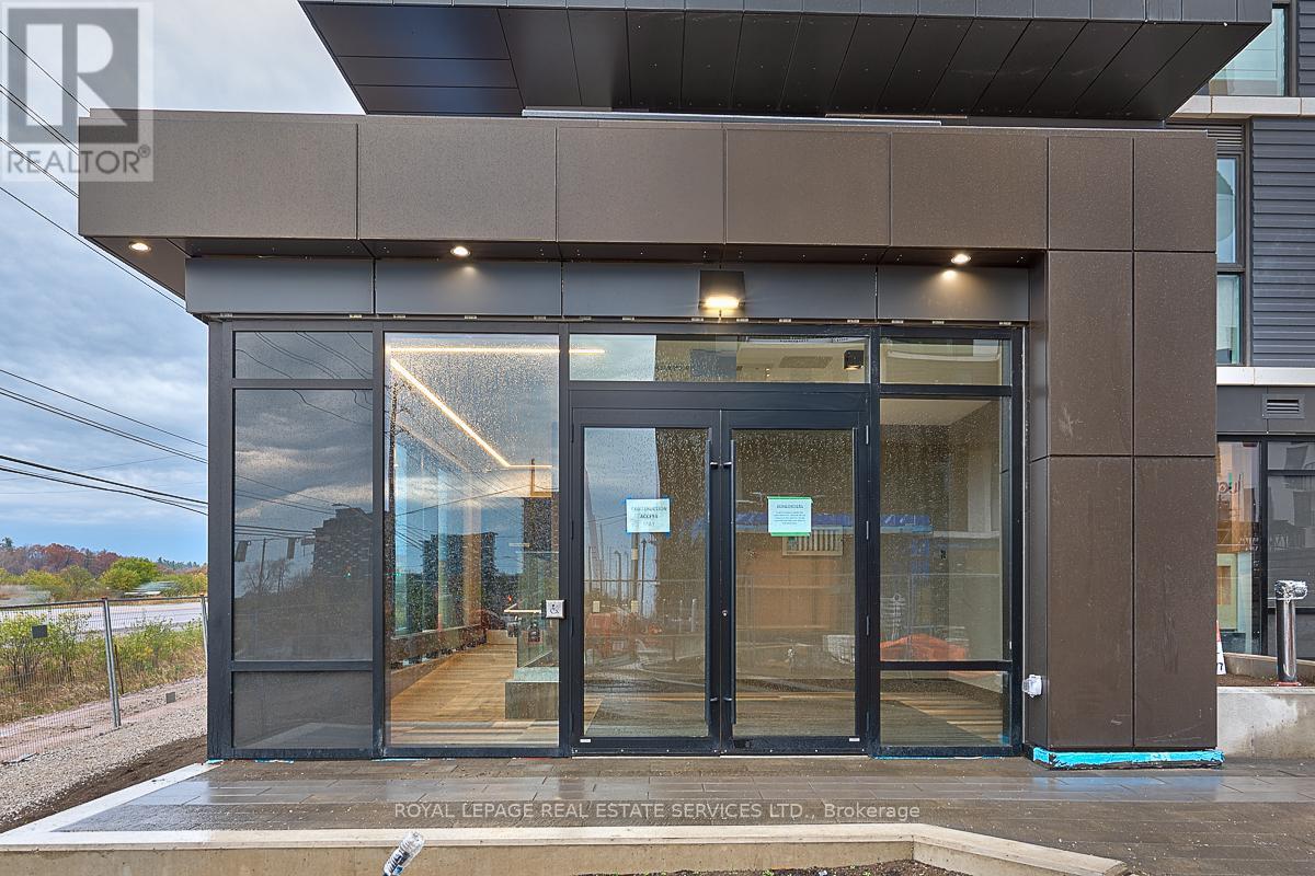 610 - 345 Wheat Boom Drive, Oakville, Ontario  L6H 7X4 - Photo 2 - W12555806