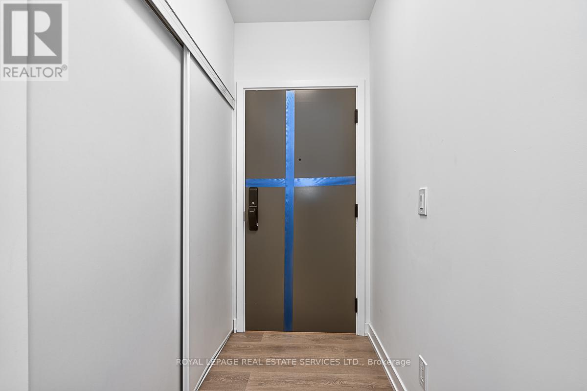 610 - 345 Wheat Boom Drive, Oakville, Ontario  L6H 7X4 - Photo 3 - W12555806