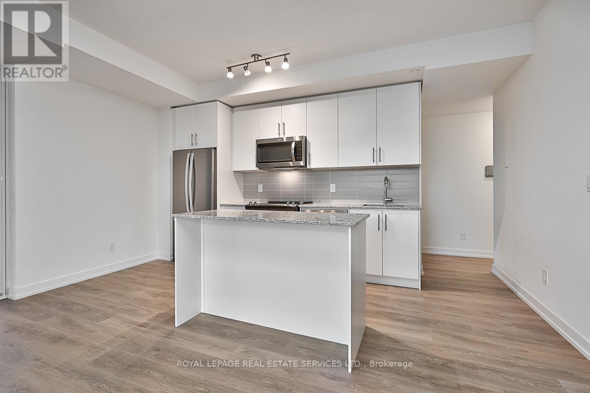 610 - 345 Wheat Boom Drive, Oakville, Ontario  L6H 7X4 - Photo 4 - W12555806