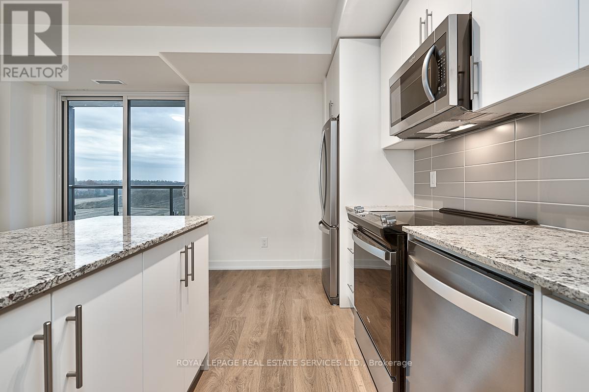 610 - 345 Wheat Boom Drive, Oakville, Ontario  L6H 7X4 - Photo 6 - W12555806
