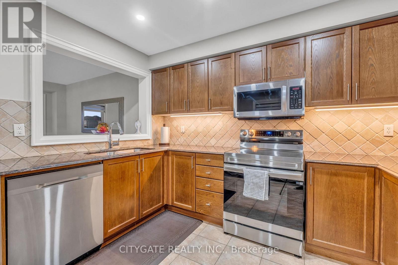 151 Spicebush Terrace, Brampton, Ontario L6X 0K6 - Photo 14 - W12555660