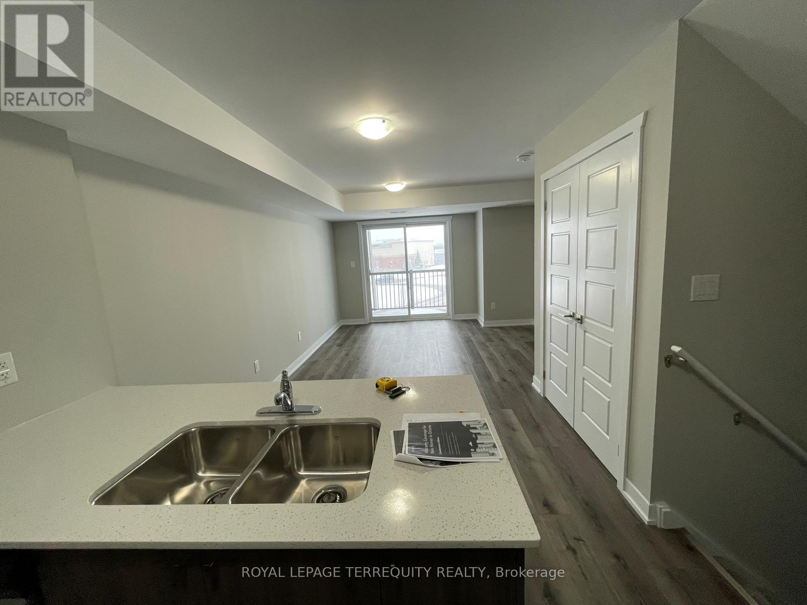 B12 - 1331 Countrystone Drive, Kitchener, Ontario  N2N 0C5 - Photo 2 - X12555938