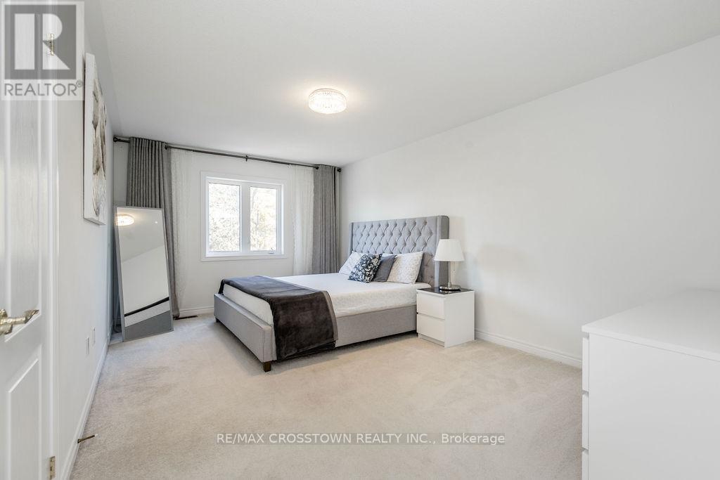 49 Greenwood Drive, Essa, Ontario  L3W 0N5 - Photo 25 - N12475422