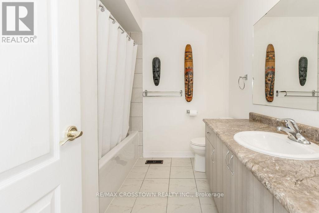 49 Greenwood Drive, Essa, Ontario  L3W 0N5 - Photo 36 - N12475422