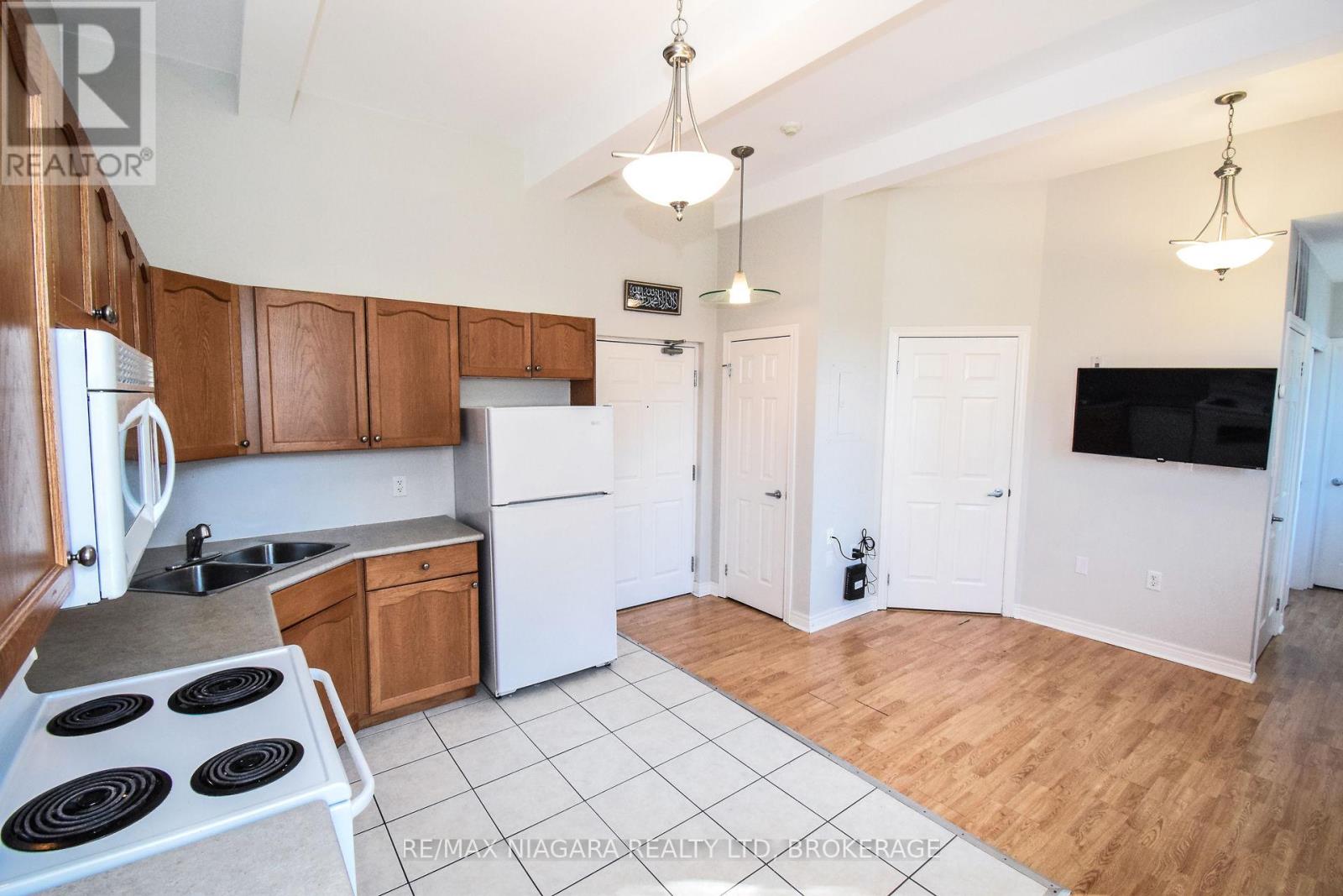 114 - 6365 Drummond Road, Niagara Falls, Ontario  L2G 4N1 - Photo 6 - X12401032