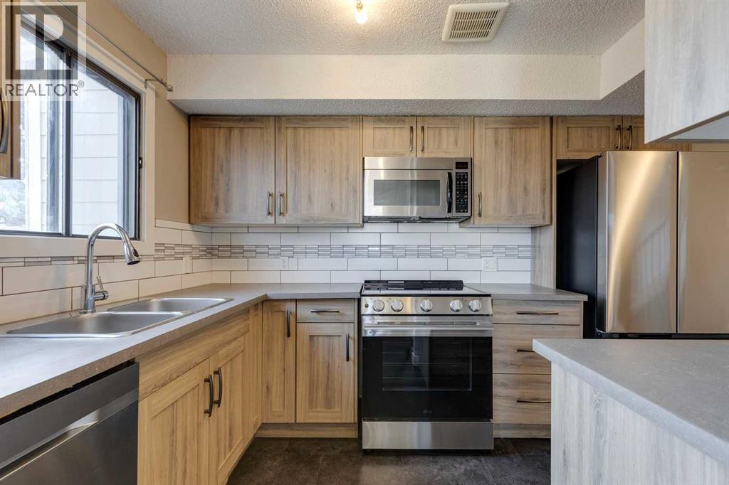 1, 102 Grier Terrace Ne, Calgary, Alberta  T2K 5Y6 - Photo 4 - A2270634