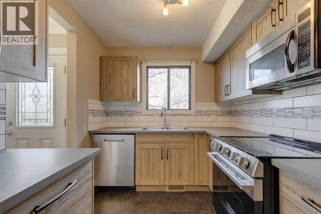 1, 102 Grier Terrace Ne, Calgary, Alberta  T2K 5Y6 - Photo 6 - A2270634