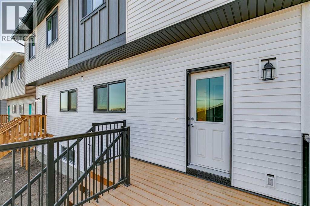 6 Drystone Way Nw, Calgary, Alberta  T3R 1E7 - Photo 4 - A2242703